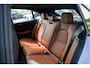 Porsche Macan 4 100 kWh Ijsgrijs | Luchtvering | Head-Up Display | 18- Voudige Stoelen | Panoramadak | Passengerdisplay | Trekhaak | Bose Audio | Innodrive