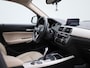 BMW 1-Serie 118i Corporate Lease High Executive AUTOMAAT | NAVIGATIE | CAMERA | M-STUUR | LEDER | PDC | CLIMA | STOELVERWARMING | LED | 12 MAANDEN BOVAG GARANTIE |