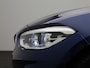 BMW 1-Serie 118i Corporate Lease High Executive AUTOMAAT | NAVIGATIE | CAMERA | M-STUUR | LEDER | PDC | CLIMA | STOELVERWARMING | LED | 12 MAANDEN BOVAG GARANTIE |