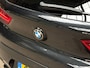 BMW X2 1.8i sDrive M Sport 140Pk Automaat (NAVIGATIE, M PAKKET, BLACK PACK, LEDER, STOELVERWARMING, SPORTSTOELEN, GETINT GLAS, SFEERVERLICHTING, PARKEERSENSOREN, NIEUWSTAAT)