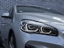 BMW 2-Serie Active Tourer 220i High Executive | M-Sport | Head-up Display | Achteruitrijcamera | Elektrisch Verstelbare Voorstoelen | Trekhaak | Lederen Bekleding | Navigatie | Elektrische Achterklep | Lichtmetalen Velgen 18 inch | Stoelverwarming