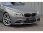 BMW 5-Serie Touring M550xd | Luchtvering | Head-up | Massage | Bang&Olufsen | Entertainment achter | Keyless | Stoelkoeling | ACC | 2016.