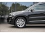 Volkswagen Tiguan 1.4 TSI Sport&Style | Vol lederen interieur | Nieuwe distributieketting | Trekhaak | schermen in. hoofdsteunen | lage km | Getint glas | Cruise | Climate