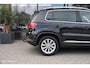 Volkswagen Tiguan 1.4 TSI Sport&Style | Vol lederen interieur | Nieuwe distributieketting | Trekhaak | schermen in. hoofdsteunen | lage km | Getint glas | Cruise | Climate