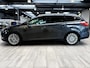 Ford Focus Wagon EcoBoost 125 pk Titanium | Trekhaak | Voorruitverw. | Navi | Clima | Cruise | 17" | Keyless entry