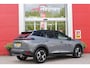 Peugeot 2008 1.2 Hybrid 145PK AUTOMAAT GT | ELEKTRISCH BEDIENBARE BESTUURDERSSTOEL | NAVIGATIE | FULL LED KOPLAMPEN | DRAADLOZE APPLE CARPLAY/ANDROID AUTO | ADAPTIVE CRUISE CONTROL | CAMERA VOOR + ACHTER | CLIMATE CONTROL | LICHTMETALEN VELGEN 17" | KEYLESS ENTRY/START | DAB+ RADIO | ALCANTARA/LEDEREN BEKLEDING  | DODEHOEK DETECTIE | PARKEERSENSOREN VOOR + ACHTER | STOEL VERWARMING | DRAADLOZE TELEFOONLADER |