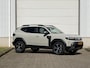 Dacia Duster 1.8 hybrid 155 limited edition / Rondom Camera / Stoel en Stuurwielverwarming / Navigatie / Dodehoekdetectie / Adaptieve Cruise Control / Voorruitverwarming /