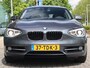 BMW 1-Serie 118i Business+ Navi / Schui/kanteldak / Led / Cruise / Afn Trekhaak /Sportstoelen / Meeneem prijs