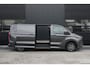 Ford E-Transit Custom 340 L2H1 Limited 71 kWh 218pk | 2x Schuif | DDS LED | 360 Camera | B&O | ACC | Navi | Verwarmd stuurwiel | Elek trekhaak | AGR-stoel | Rijklaar
