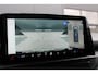 Ford E-Transit Custom 340 L2H1 Limited 71 kWh 218pk | 2x Schuif | DDS LED | 360 Camera | B&O | ACC | Navi | Verwarmd stuurwiel | Elek trekhaak | AGR-stoel | Rijklaar