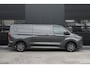 Ford E-Transit Custom 340 L2H1 Limited 71 kWh 218pk | 2x Schuif | DDS LED | 360 Camera | B&O | ACC | Navi | Verwarmd stuurwiel | Elek trekhaak | AGR-stoel | Rijklaar