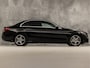 Mercedes-Benz C-klasse 180 AMG Sport 156Pk Automaat (NAVIGATIE, CAMERA, LEDER, ZWART HEMEL, STOELVERWARMING, SPORTSTOELEN, GETINT GLAS, NIEUWSTAAT)
