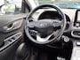 Hyundai Kona Electric EV Fashion 64 kWh | SOH: nnb | 3 fase | Warmtepomp | Trekhaak | Camera | Adaptive CC | Blindspot |