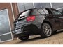 BMW 1-Serie 116i Executive | Sportstuur | Cruise control | Xenon | Stoelverwarming | Dakraam | Climate control | Navigatie Professional | Bluetooth | Lichtpakket | PDC | 18 inch