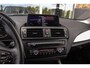 BMW 1-Serie 116i Executive | Sportstuur | Cruise control | Xenon | Stoelverwarming | Dakraam | Climate control | Navigatie Professional | Bluetooth | Lichtpakket | PDC | 18 inch