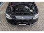BMW 1-Serie 116i Executive | Sportstuur | Cruise control | Xenon | Stoelverwarming | Dakraam | Climate control | Navigatie Professional | Bluetooth | Lichtpakket | PDC | 18 inch