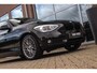 BMW 1-Serie 116i Executive | Sportstuur | Cruise control | Xenon | Stoelverwarming | Dakraam | Climate control | Navigatie Professional | Bluetooth | Lichtpakket | PDC | 18 inch