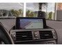 BMW 1-Serie 116i Executive | Sportstuur | Cruise control | Xenon | Stoelverwarming | Dakraam | Climate control | Navigatie Professional | Bluetooth | Lichtpakket | PDC | 18 inch