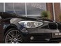 BMW 1-Serie 116i Executive | Sportstuur | Cruise control | Xenon | Stoelverwarming | Dakraam | Climate control | Navigatie Professional | Bluetooth | Lichtpakket | PDC | 18 inch