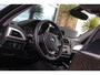 BMW 1-Serie 116i Executive | Sportstuur | Cruise control | Xenon | Stoelverwarming | Dakraam | Climate control | Navigatie Professional | Bluetooth | Lichtpakket | PDC | 18 inch