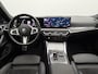 BMW i4 eDrive40 84 kWh M Sport Pro SOH 97,4% | Wegklapbare Trekhaak | 360° Camera | Harman/Kardon | Schuif\Kanteldak