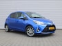 Toyota Yaris 1.5 Hybrid Dynamic | Trekhaak | Navi | Camera | Cruise | Automaat | 15" LM | Keyless | Zeer nette auto |