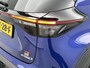 Toyota Yaris Cross 1.5 Hybrid GR Sport | Head-up display | Stoel+stuurverwarming | Dodehoek detectie | Elektrische achterklep | Parkeersensoren voor+achter | Draadloze telefoonlader | Apple CarPlay/Android Auto |