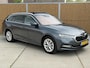 Skoda Octavia Combi 1.0 e-TSI Business Edition Plus Automaat | Panoramadak | Half leer/alcantara | Stoelverwarming voor en achter | Stuurwielverwarming | Getint glas | Achteruitrijcamera | Elektrisch bedienbare achterklep | Parkeersensoren voor en achter