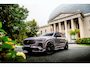Volvo XC90 2.0 T8 Plug-in hybrid AWD Ultra Dark Executive Black Edition Executive | Trekhaak | Heico bodykit | Luchtvering | Bowers & Wilkins Premium Audio | Adaptieve Cruise Control | Elektr. schuif-\-kanteldak | 360 Camera | Extra getint glas | Gelamineerde ramen | Geventileerde voorstoelen | Stoelverwarming | Stoelmassage | Verwarmd stuurwiel | Google Services | Head-up display | Alcantara hemelbekleding | 22" Lichtmetalen velgen |
