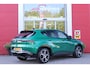 Alfa Romeo Tonale 1.5T Hybrid 160PK VELOCE | PREMIUM PACK: LEDEREN BEKLEDING/GEVENTILEERDE VOORSTOELEN/4-VOUDIG ELEKTRISCH VERSTELBARE LENDESTEUN VOORSTOELEN/ELEKTRISCH BEDIENBARE /HOOGGLANS ZWARTE RAAMOMLIJSTING/AMBIENT LIGHTING | TECHNOLOGY PACK: PARKEERWAARSCHUWING VOOR EN ACHTER/360° CAMERA/AUTOMATISCH INPARKEREN/ AUTONOMOUS DRIVING LEVEL 2: ADAPTIVE CRUISE CONTROL/LANE CENTERING ASSIST/TRAFFIC JAM ASSIST DODEHOEK DETECTIE AUTOMATISCH DIMMENDE BUITENSPIEGELS ELEKTRISCH BEDIENBARE ACHTERKLEP | WINTERPACK: STOELVERWARMING VOOR/STUURVERWARMING/VERWARMBARE RUITENSPROEIERS | 19" LICHTMETALEN VELGEN | DRAADLOZE TELEFOONLADER | NAVIGATIE | DRAADLOZE APPLE CARPLAY/ANDROID AUTO | FULL LED MATRIX KOPLAMPEN |