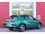 Alfa Romeo Tonale 1.5T Hybrid 160PK VELOCE | PREMIUM PACK: LEDEREN BEKLEDING/GEVENTILEERDE VOORSTOELEN/4-VOUDIG ELEKTRISCH VERSTELBARE LENDESTEUN VOORSTOELEN/ELEKTRISCH BEDIENBARE /HOOGGLANS ZWARTE RAAMOMLIJSTING/AMBIENT LIGHTING | TECHNOLOGY PACK: PARKEERWAARSCHUWING VOOR EN ACHTER/360° CAMERA/AUTOMATISCH INPARKEREN/ AUTONOMOUS DRIVING LEVEL 2: ADAPTIVE CRUISE CONTROL/LANE CENTERING ASSIST/TRAFFIC JAM ASSIST DODEHOEK DETECTIE AUTOMATISCH DIMMENDE BUITENSPIEGELS ELEKTRISCH BEDIENBARE ACHTERKLEP | WINTERPACK: STOELVERWARMING VOOR/STUURVERWARMING/VERWARMBARE RUITENSPROEIERS | 19" LICHTMETALEN VELGEN | DRAADLOZE TELEFOONLADER | NAVIGATIE | DRAADLOZE APPLE CARPLAY/ANDROID AUTO | FULL LED MATRIX KOPLAMPEN |