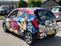 Kia Picanto 1.0 VVTI beschilderd door Selwyn Senatori