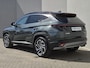 Hyundai Tucson 1.6 T-GDI PHEV Comfort Smart 4WD / Facelift Model / Fabrieksgarantie tot 09-2029 / Apple Carplay Android Auto / Stuur- & Stoelverwarming / Head Up Display / Trekgewicht 1210 kg / Elektrische achterklep / Achteruitrijcamera / Keyless Entry/Start / Adaptief cruise control /