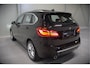 BMW 2-Serie Active Tourer 218i High Executive Luxury Line | Panoramadak | Stoelverwarming | Head-Up Display | Parkeersensoren | Navigatie | Trekhaak | Cruise Control | Climate Control | NAP