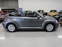 Volkswagen Beetle Cabriolet 1.2 TSI Design Airco-ecc Stoelverwarming Navigatie Sportvelgen PDC Windscherm Boekjes aanwezig Bluetooth Elektrische cabrioletkap Cruise control Metallic lak Nette staat