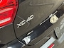 Volvo XC40 1.5 T4 Recharge R-Design Expression 211Pk Automaat (APPLE CARPLAY, GROOT NAVI, STUUR/STOELVERWARMING, LEDER, CAMERA, SPORTSTOELEN, GETINT GLAS, ELEK ACHTERKLEP, NIEUWSTAAT)