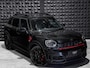 MINI Countryman Mini 2.0 John Cooper Works ALL4 JCW Pack | Pano | 19"| HUD | H/K | JCW Stoelen | Adap. Li. |Ad. Cruise | Keyl. | Alarm |
