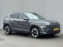 Hyundai Kona Electric Comfort Smart 65.4 kWh / Fabrieksgarantie tot 9-2030 / SOH 100% / Stuur- & Stoel verwarming / Achteruitrijcamera / Apple Carplay Android Auto / Keyless Entry/Start / Adaptief cruise control / Climate control /
