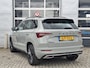 Skoda Karoq 1.5 TSI ACT Sportline Business | Navigatie/Android/Apple Carplay | LM Velgen 18" | Voorstoelen/Achterbank Verwarmd | Elektrisch Glazen Panoramadak | Cruise Control Adaptief | Airco |