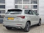 Skoda Karoq 1.5 TSI ACT Sportline Business | Navigatie/Android/Apple Carplay | LM Velgen 18" | Voorstoelen/Achterbank Verwarmd | Elektrisch Glazen Panoramadak | Cruise Control Adaptief | Airco |
