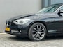 BMW 1-Serie 118i Business+|Automaat|2012|NAP|Dealer|Trekhaak|Cruise|Sport pakket|Navi|PDC|17" LMV