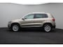 Volkswagen Tiguan 1.4 TSI R-Line Edition 2015 | Trekhaak Uitklapbaar | Parkeersensoren | Achteruitrij Camera | Elektrische Stoel | Navigatie | Cruise Control | Onderhoudshistorie | 2 Sleutels