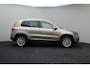 Volkswagen Tiguan 1.4 TSI R-Line Edition 2015 | Trekhaak Uitklapbaar | Parkeersensoren | Achteruitrij Camera | Elektrische Stoel | Navigatie | Cruise Control | Onderhoudshistorie | 2 Sleutels