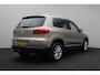 Volkswagen Tiguan 1.4 TSI R-Line Edition 2015 | Trekhaak Uitklapbaar | Parkeersensoren | Achteruitrij Camera | Elektrische Stoel | Navigatie | Cruise Control | Onderhoudshistorie | 2 Sleutels