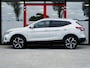 Nissan Qashqai 1.2 Tekna | 1e Eigenaar | Trekhaak | Bose HiFi Audio | Parelmoer White | Panoramadak | Stoelverwarming | Dode Hoek Detectie | 360 Camera | Navigatie | Climate Control | Cruise Control | Origineel Nederlands |