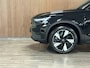 Volvo EX40 Single Motor Extended Range Ultra 82 kWh | Schuifdak | 360° Camera | Harman Kardon | Adaptieve Cruise Control | Bestuurdersstoel elektrisch geheugen | Stoel en Stuurwielverwarming | 19 Inch | Passagiersstoel elektrisch | Microtech / alcantara bekleding met wit stiksel en bies | Zitting verlenging voorstoelen | Pilot Assist | BLIS Dode Hoek Detectie | Warmtepomp | Google Infotainment | Keyless Drive | Verlichtingspack 2 | Parkeersensoren voor+achter | Privacy Glass | Elektrisch bedienbare achterklep | Draadloos telefoon opladen | DAB Radio | Apple Carplay/Android Auto | Volvo On Call met mobiele App functie | Onyx Black Metallic |