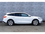 Ford Focus Wagon 1.5 EcoBoost 150 Active X Business | Cruise Control Adaptief | Dodehoekdetectie | Head-up Display | Achteruitrijcamera | Parkeersensoren | Keyless Entry | Elektrische Achterklep | Navigatie | Apple Carplay | Android Auto