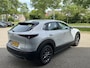 Mazda CX-30 2.5 e-SkyActiv-G M Hybrid Prime-line NL-Auto, Navigatie, Apple Carplay / Android Auto, A-Rij-Camera, Parkeerhulp vóór, Head-Up, Keyless, Cruise Controle ad., Audio systeem, USB-C, Lichtmetaal.