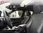 BMW 3-Serie 320i High Executive M-Sport Schuif/kanteldak Apple CarPlay | Hifi | Achteruitrijcamera | DAB | Leer | NL Auto!