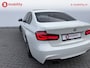 BMW 3-Serie 320i High Executive M-Sport Schuif/kanteldak Apple CarPlay | Hifi | Achteruitrijcamera | DAB | Leer | NL Auto!